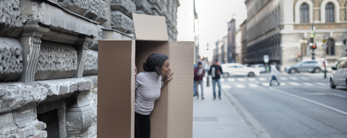 A woman stepping out of the box.