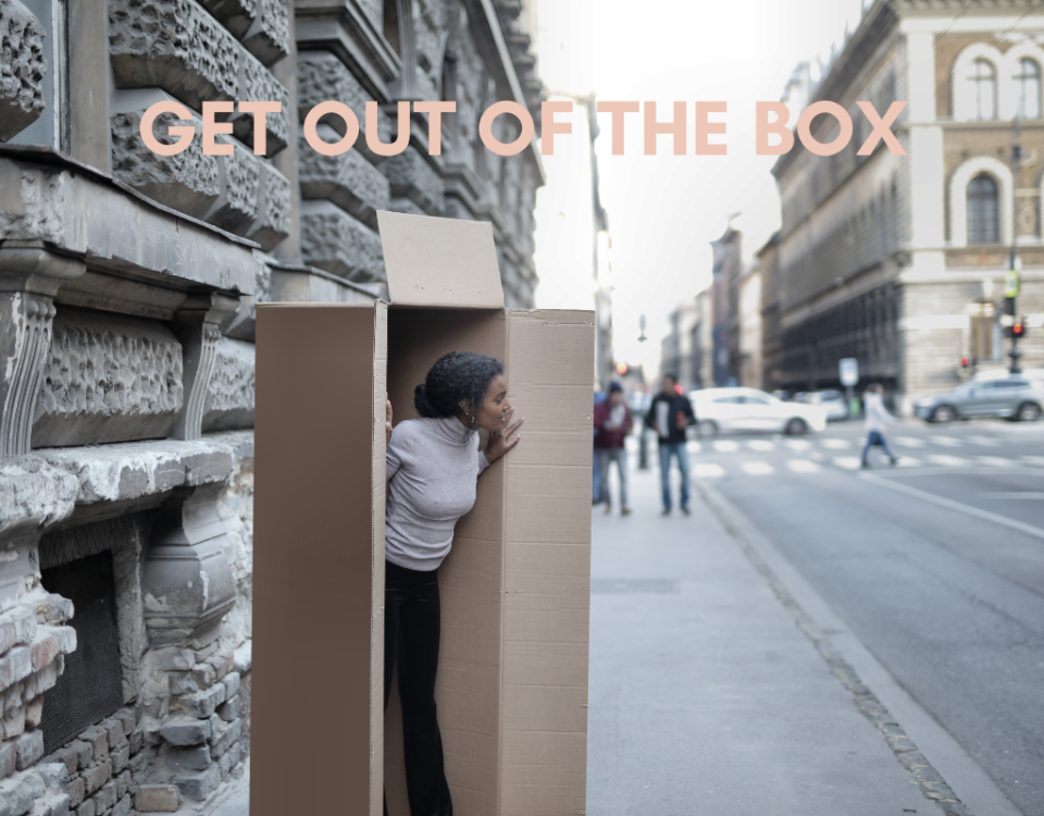 A woman stepping out of the box.