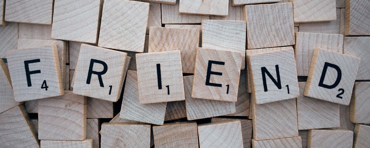 The word friend on Scrabble pieces. Beyond Social Blog post at http://stylishcreativeyou.com