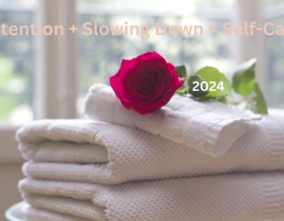 Self-care is a priority. This picture is of a rose and towels ready and waiting for you to wind down and relax.