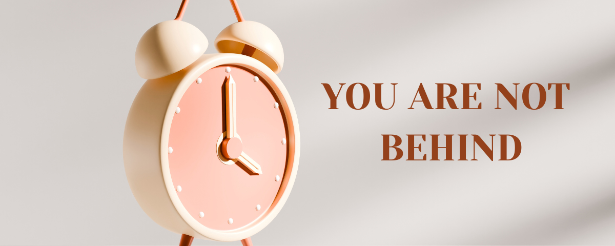 a picture of a clock with the words you are not behind next to it