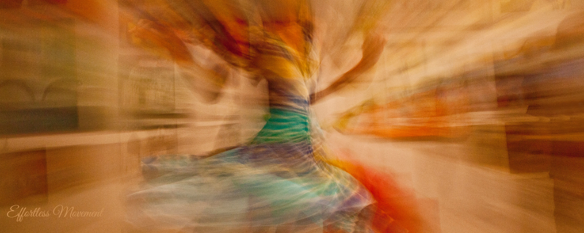 A dancer with effortless movement and flowing fabric