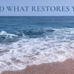 Ocean waves gently rolling onto a sandy beach beneath the words "Find What Restores You," representing peace, restoration, intentional living, and self-care.